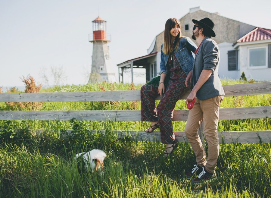 young-stylish-hipster-couple-love-walking-with-dog-countryside_285396-1354