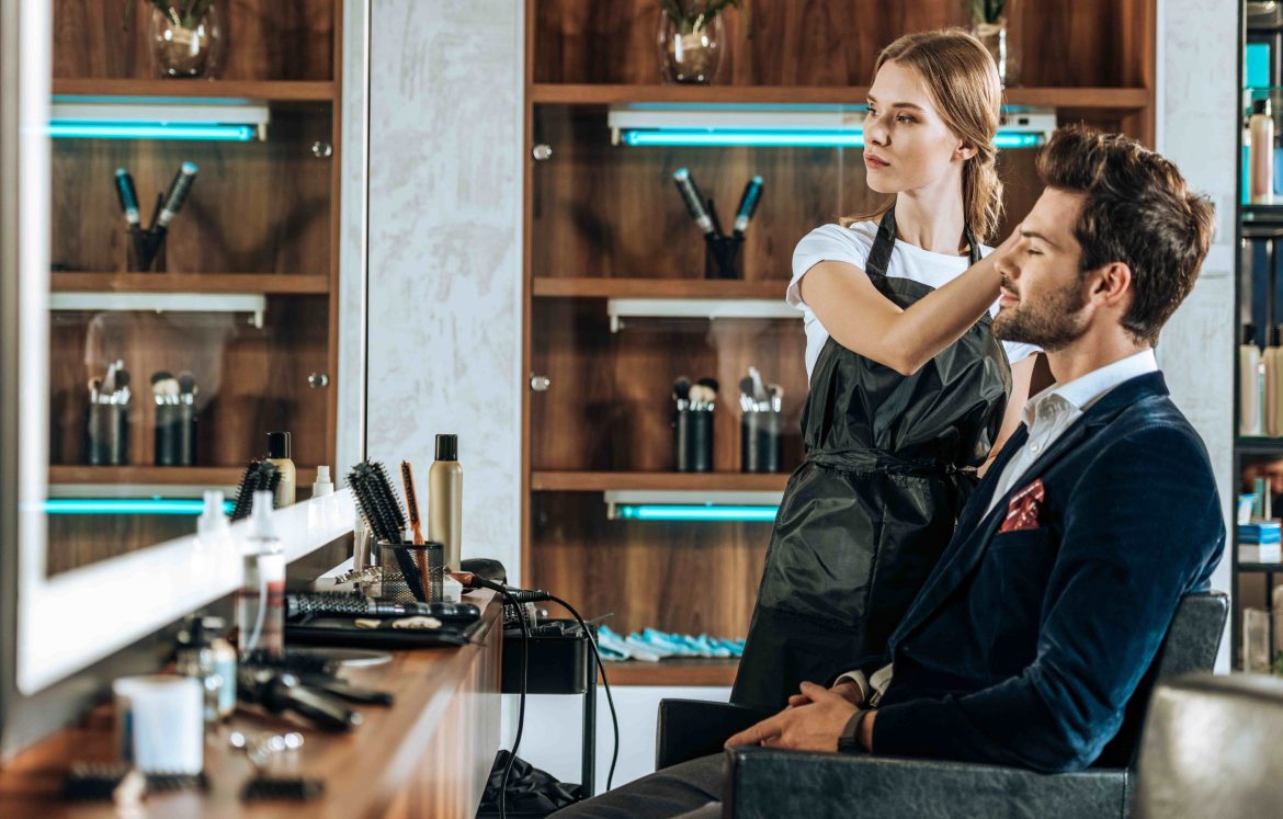 beautiful-young-hairdresser-doing-hairstyle-to-han-2024-11-19-16-09-24-utc_11zon-1-scaled